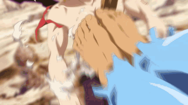 a blurry picture of a person being punched by a blue object