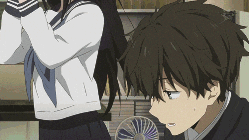 a girl in a sailor uniform is standing next to a boy in a school uniform