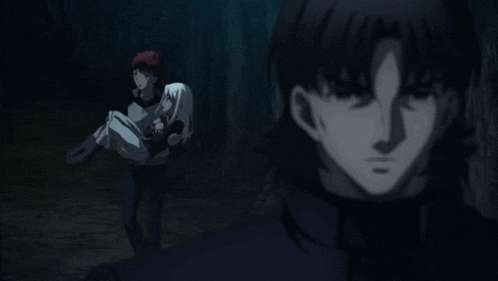 a man is carrying a woman in his arms while another man stands behind him