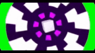 a green screen with a purple and white circle and a cube in the middle .