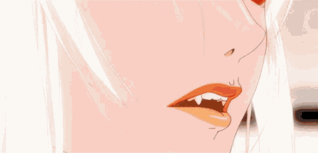 a close up of a woman 's face with a tear coming out of her eye