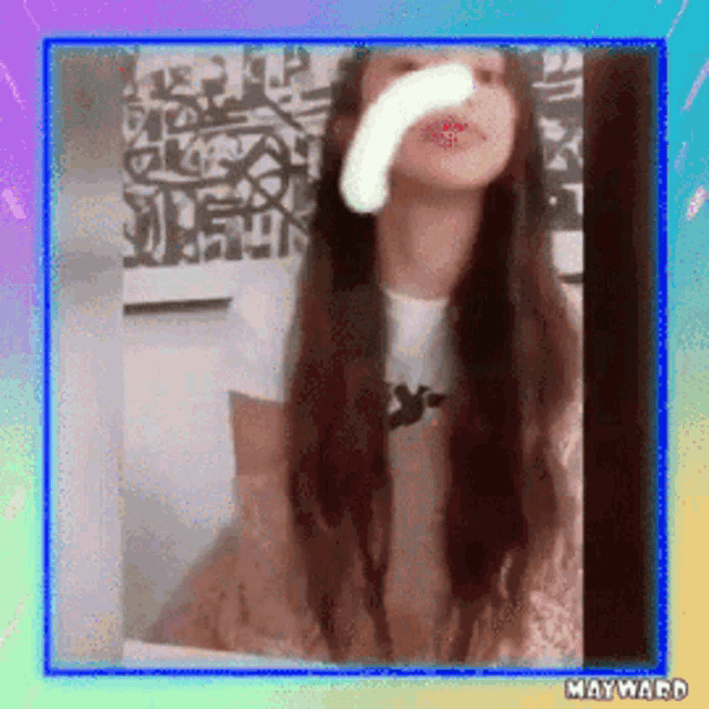 a picture of a girl with a white stripe on her nose is in a frame with mayward written on it