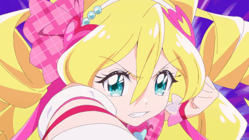 a girl with blonde hair and blue eyes is wearing a pink and white dress