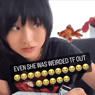 a picture of a girl with a sign that says even she was weirded tf out