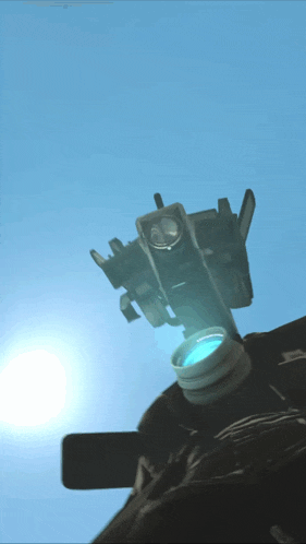 a sniper scope with a blue lens against a clear blue sky