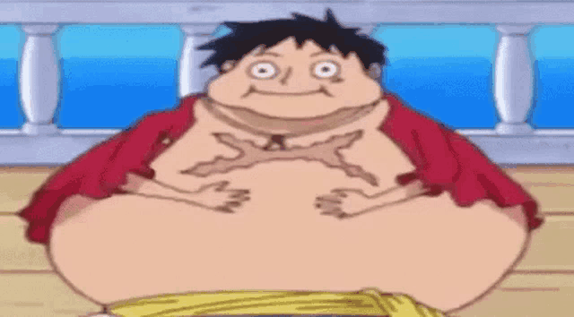 a fat monkey d luffy from one piece is sitting on a boat with his hands on his belly .