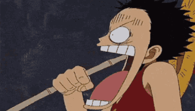 monkey d luffy from one piece is holding a stick with his mouth open