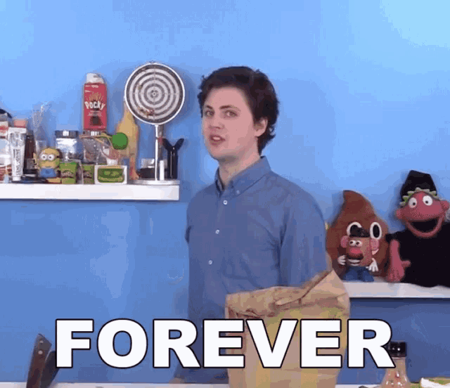 a man standing in front of a shelf with the word forever on it