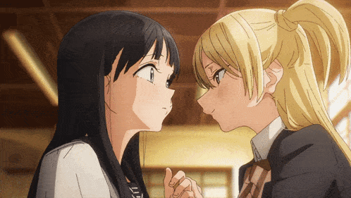 two anime girls are touching each other 's faces