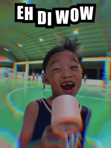 a young boy holding a roll of toilet paper with the words " eh di wow " behind him