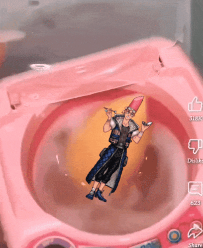 a pink washing machine with a picture of a man in the middle