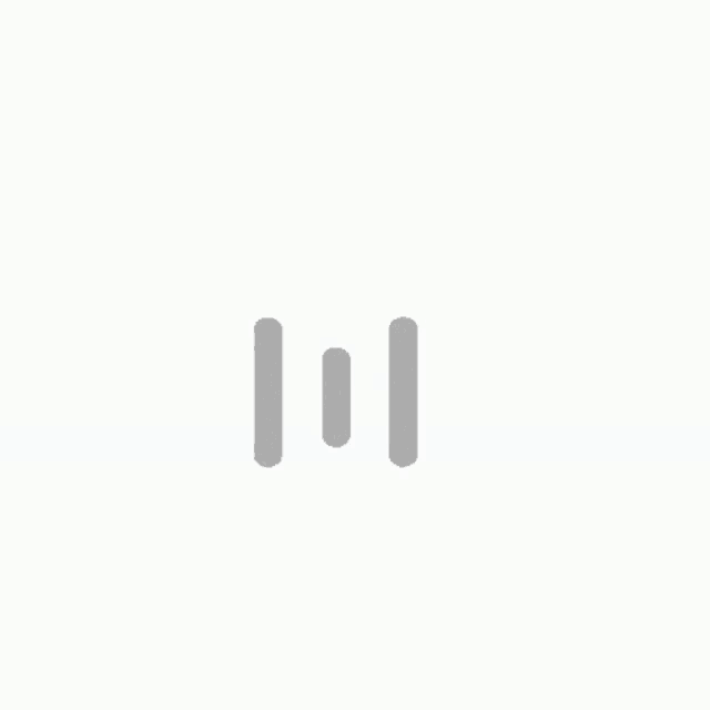 a white background with a gray icon that looks like a clock .