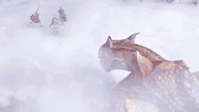 a dragon is sitting on top of a rock in the middle of a snowy field .