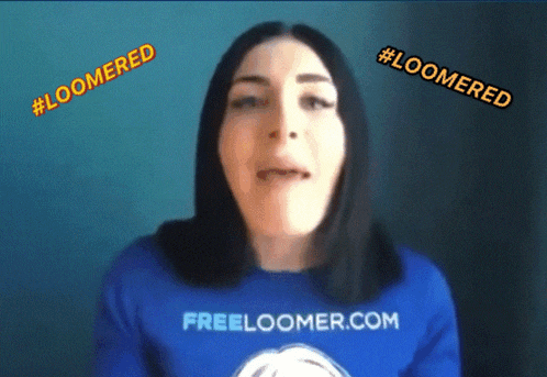 a woman wearing a blue freeloomer.com shirt
