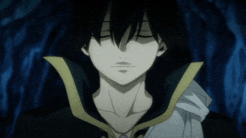a close up of a man with his eyes closed