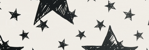 a pattern of black stars on a white background