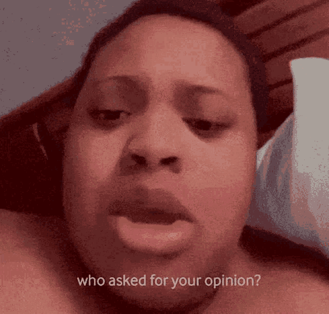 a close up of a woman 's face with the words who asked for your opinion