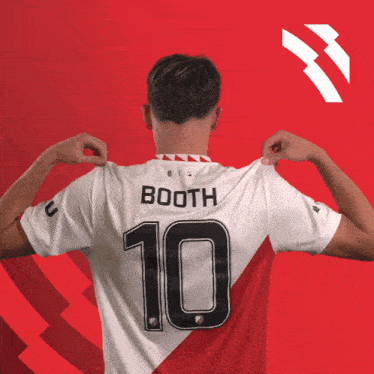 a man wearing a booth jersey with the number 10