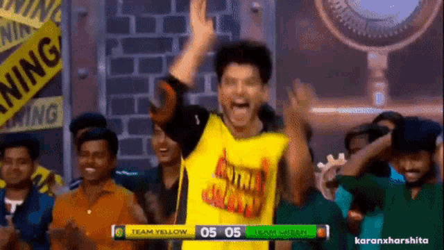 a man in a yellow shirt that says team yellow