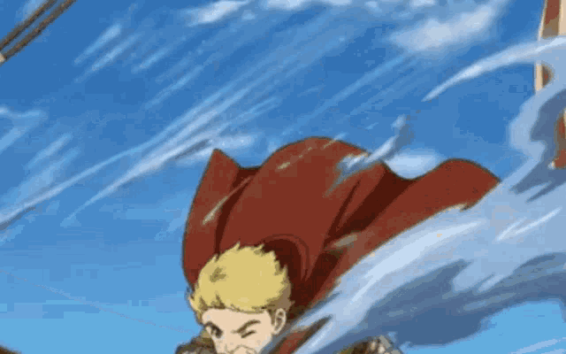 a man in a red cape is flying through the air with a blue sky in the background .