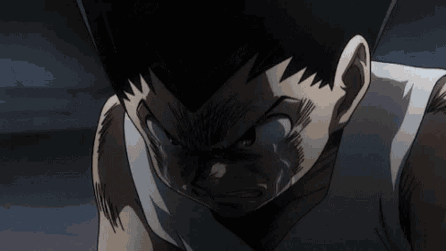 a close up of a cartoon character 's face with a tear running down his cheek