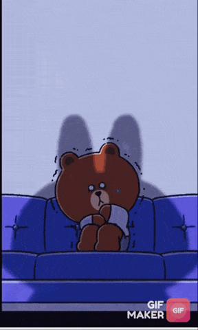 a cartoon of a teddy bear sitting on a blue couch