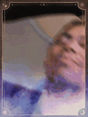 a blurry picture of a person 's face with a frame around it