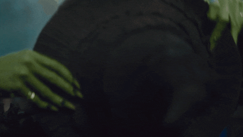 a close up of a person wearing a hat