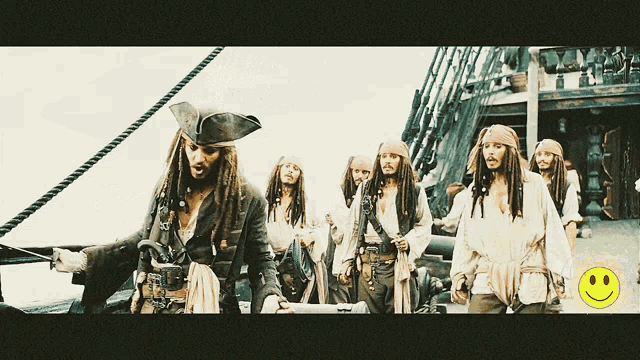 a group of pirates are standing on a ship with a smiley face in the corner
