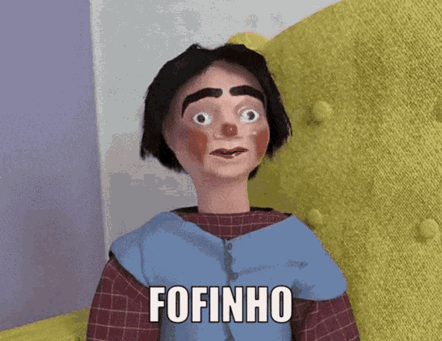 a cartoon doll with a red nose and the word fofinho on the bottom