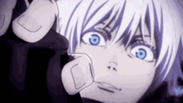 a close up of a person 's face with blue eyes and purple hair .