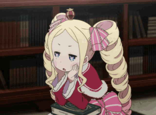 a girl with blonde hair and a crown on her head