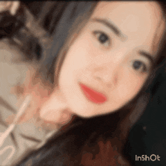 a close up of a woman 's face with the words inshot at the bottom right