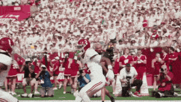 a football player in a white jersey with the number 1 on it