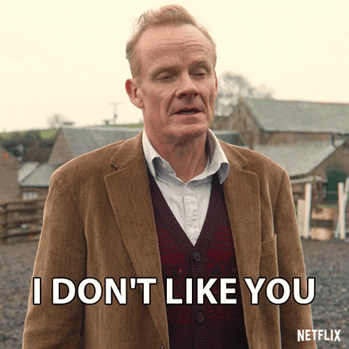 a man in a suit says " i don t like you "