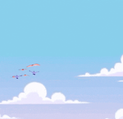 a group of birds are flying in the sky and one of them is holding something up