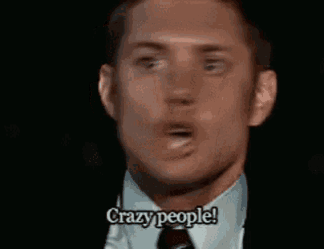 a man in a suit and tie says crazy people .