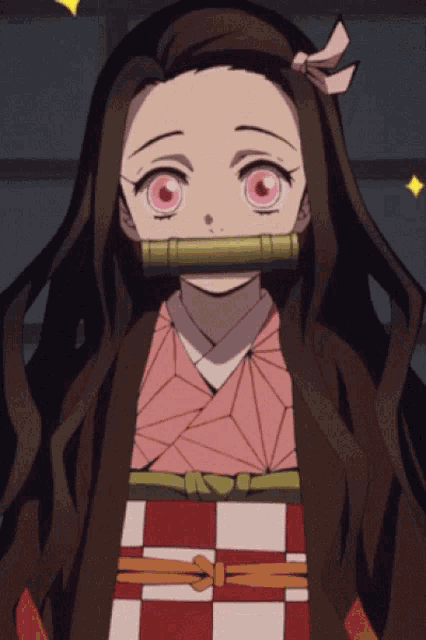 a girl with long brown hair is wearing a checkered dress