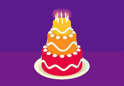 a birthday cake with candles on top of it on a plate