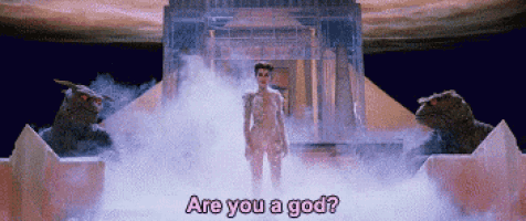 a naked woman is standing in a foggy room with the words are you a god