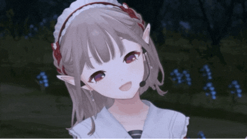 a girl with a microphone on her head looks at the camera