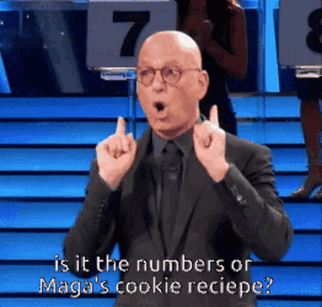 a man in a suit and glasses is asking if it is the numbers or maga 's cookie recipe