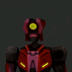 a close up of a red robot with a yellow light