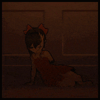a girl in a red dress with a bow on her head sits on the floor