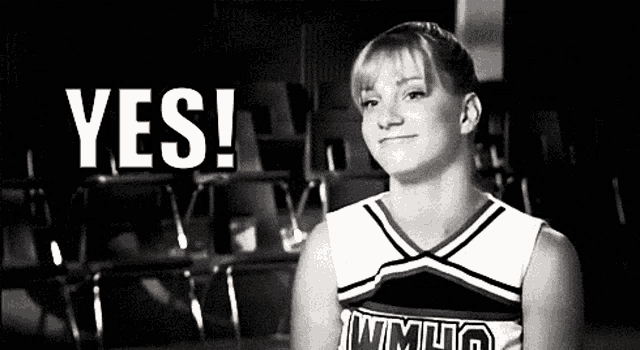 a cheerleader is standing in front of a row of chairs and says yes