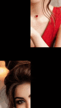 a woman wearing a red dress and a heart necklace