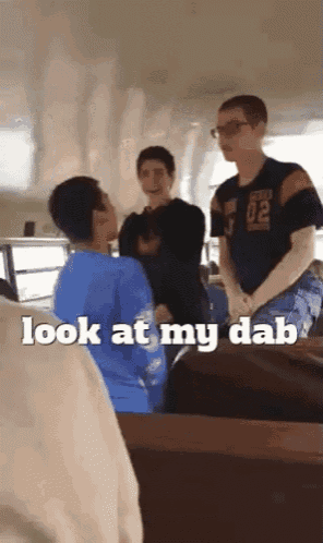 a group of people standing next to each other with the words look at my dab written on the bottom