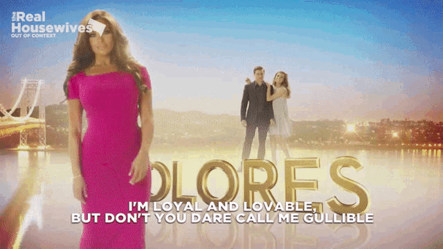 a poster for real housewives shows a woman in a pink dress and a man in a suit