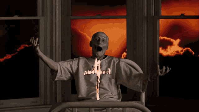 a man in a white shirt with a cross on it screams in front of a window