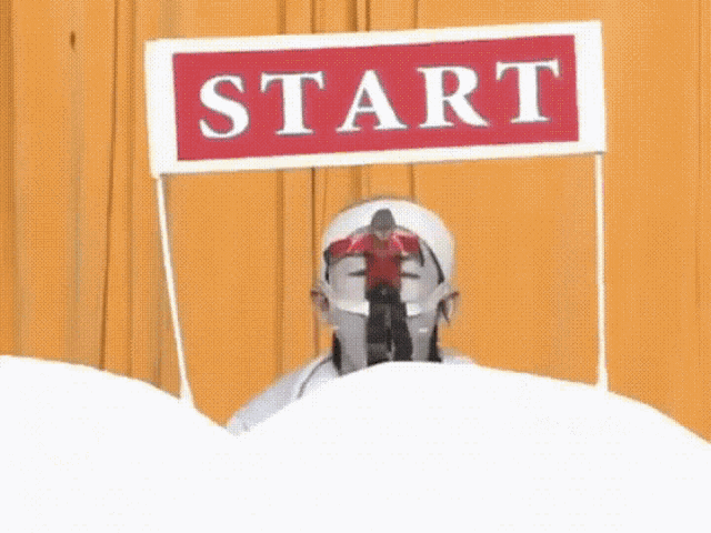 a red sign that says start on it